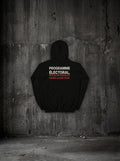 Hoodie Programme électoral noir, dos, sur mur béton